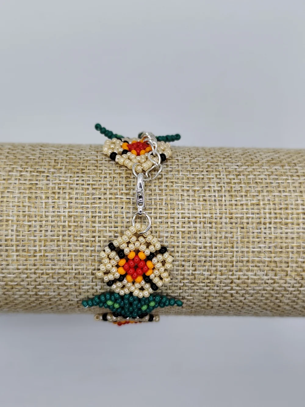 Vibrant Orange Floral Seed Bead Bracelet with Gold & Green Accents